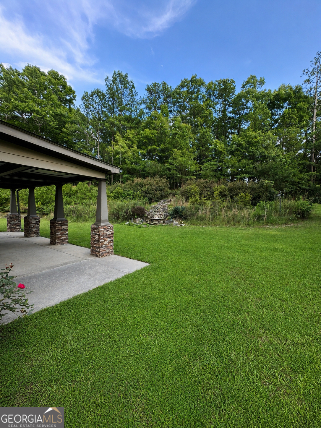 2614 Dolostone Way Dacula, GA 30019 - Photo 5 of 29 a view of yard with green space