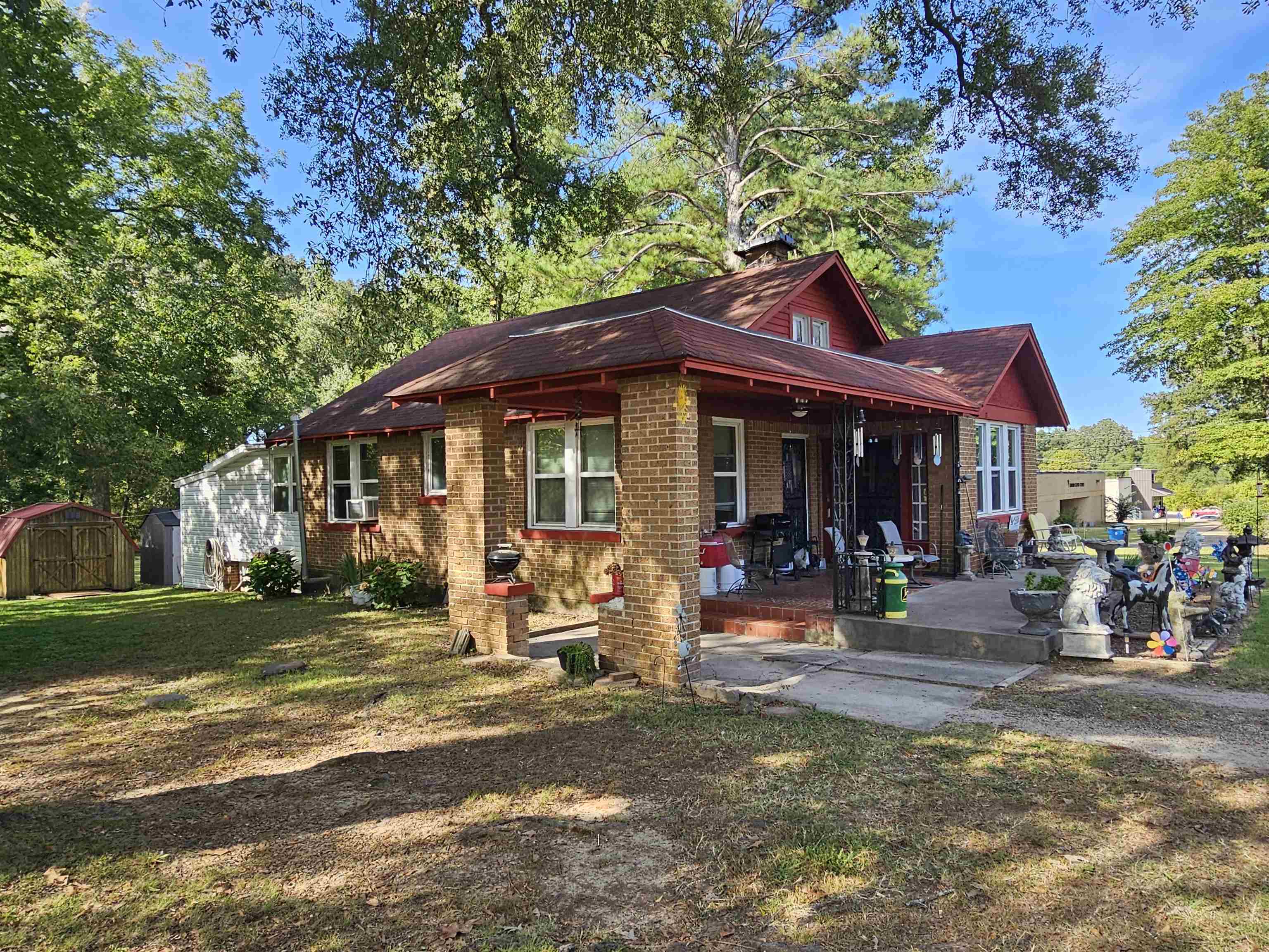 13 First Street East Stanton, TN 38069 - Photo 3 of 7 a front view of a house with porch and garden