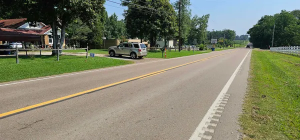 a view of a street with a building and a street view