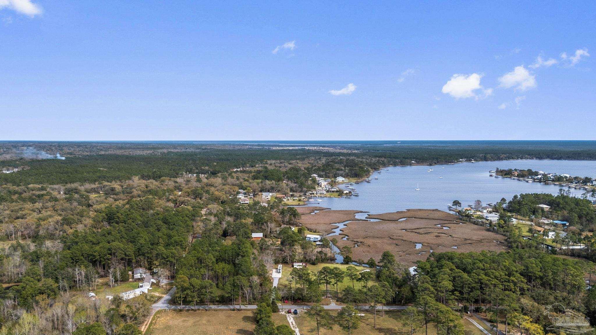 7524 Petersen Point Road Milton, FL 32583 - Photo 19 of 26 a view of lake and mountain