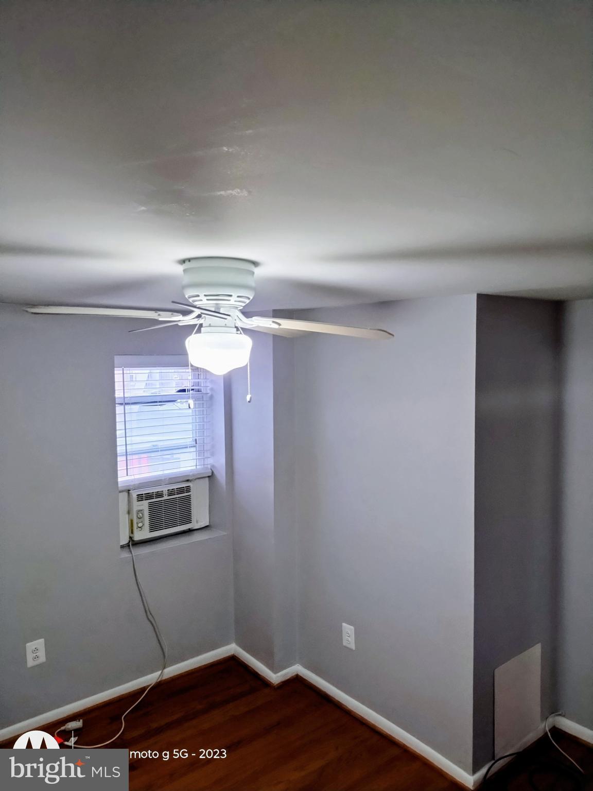 2437 Grays Ferry Avenue, Unit 3 Philadelphia, PA 19146 - Photo 15 of 15 a room with cabinets and wooden floor