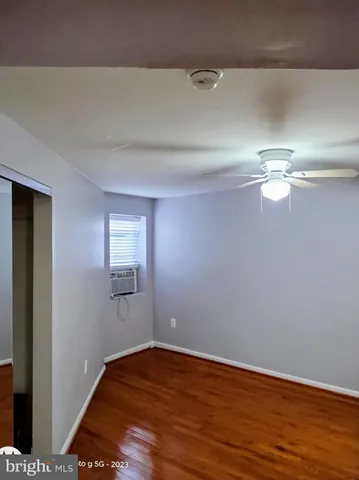 a kitchen with stainless steel appliances a refrigerator and a stove