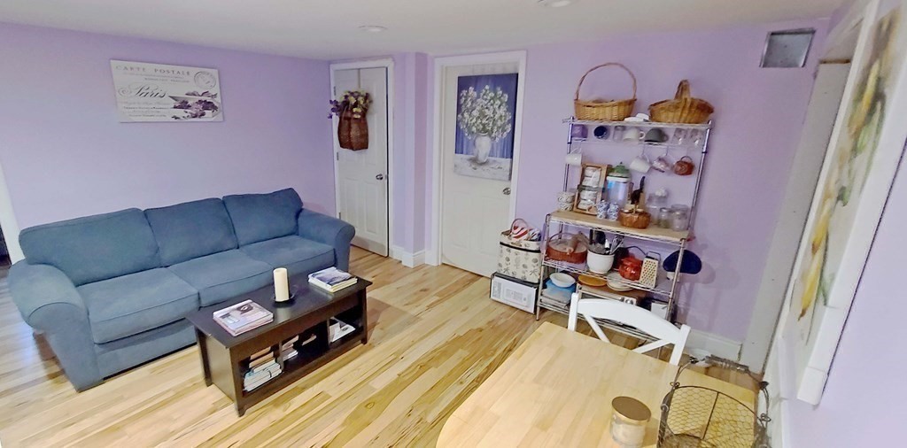 6 Sylvan Road Holbrook, MA 02343 - Photo 15 of 24 a living room with furniture and baby couch