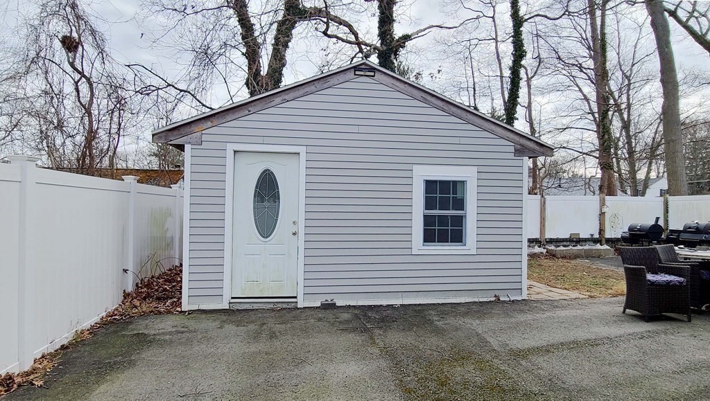 6 Sylvan Road Holbrook, MA 02343 - Photo 18 of 24 a view of a house with a garage