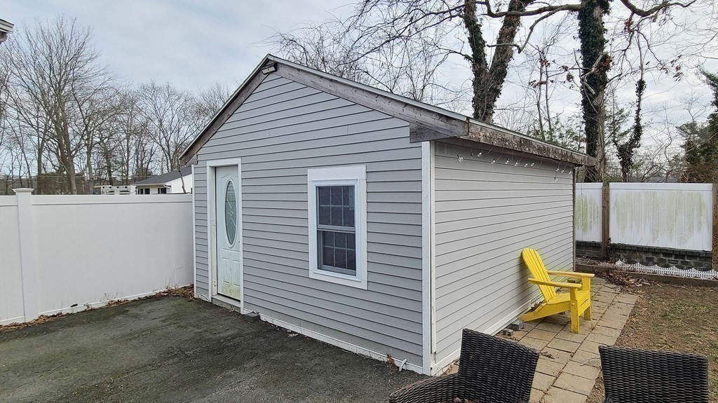 6 Sylvan Road Holbrook, MA 02343 - Photo 19 of 24 a view of a house with backyard and sitting area