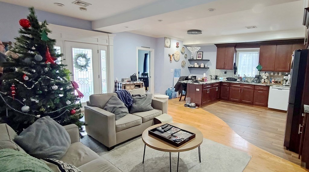 6 Sylvan Road Holbrook, MA 02343 - Photo 8 of 24 a living room with furniture or a potted plant and a large window