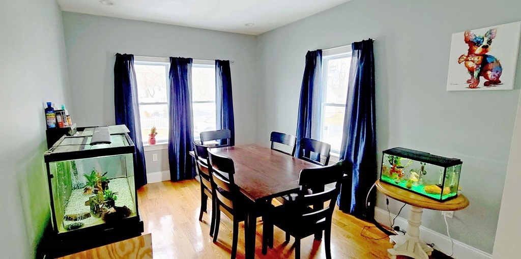 6 Sylvan Road Holbrook, MA 02343 - Photo 9 of 24 a view of a dining room with furniture and a window