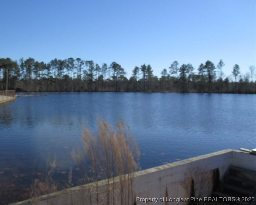 5869 Permastone Lake Road Hope Mills, NC 28348 - Photo 1 of 7 a view of a lake