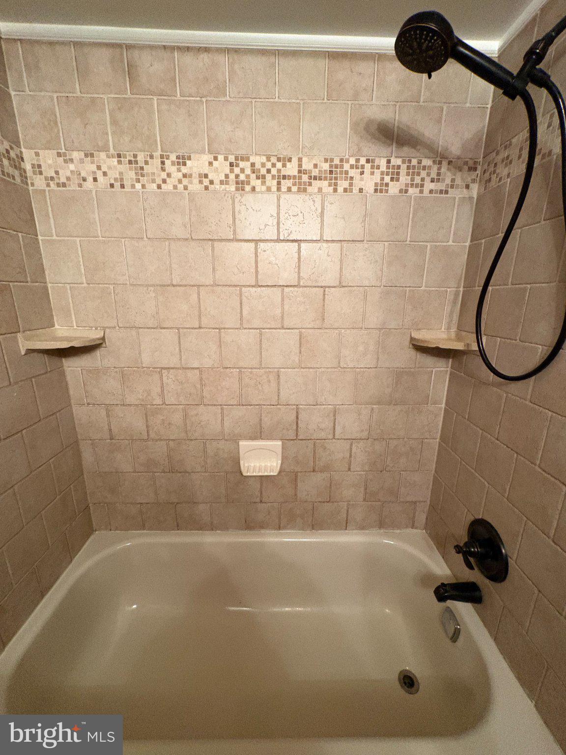 9538 State Rd., Unit B Philadelphia, PA 19114 - Photo 14 of 32 Elegant tiled shower retreat.