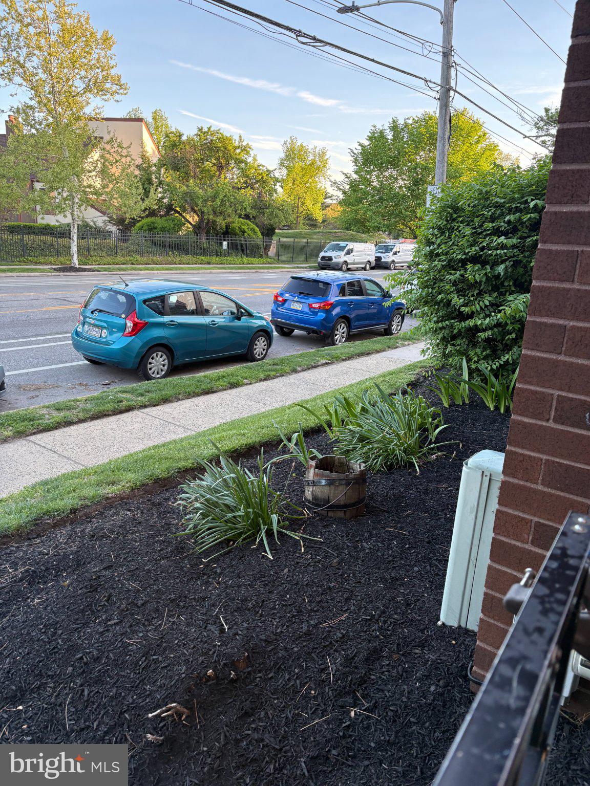 9538 State Rd., Unit B Philadelphia, PA 19114 - Photo 30 of 32 Charming street view with greenery.
