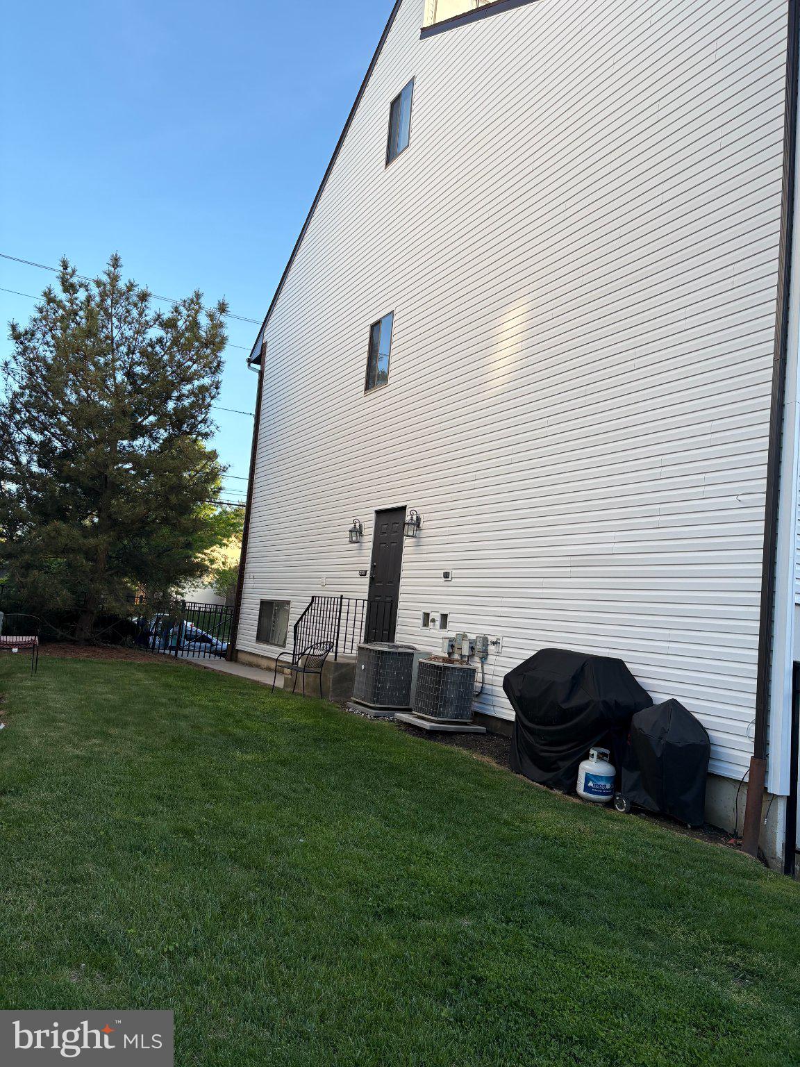9538 State Rd., Unit B Philadelphia, PA 19114 - Photo 32 of 32 Charming exterior with lush greenery.