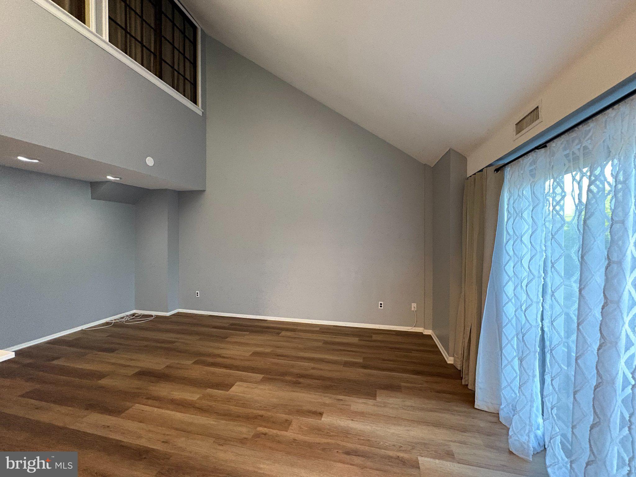 9538 State Rd., Unit B Philadelphia, PA 19114 - Photo 9 of 32 Spacious room with vaulted ceilings.