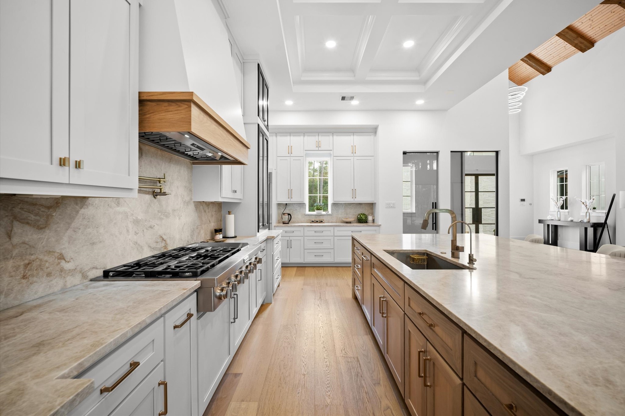 437 Sundog Road Huntsville, TX 77340 - Photo 20 of 50 Custom vent hood and full-height backsplash complete the timeless design.