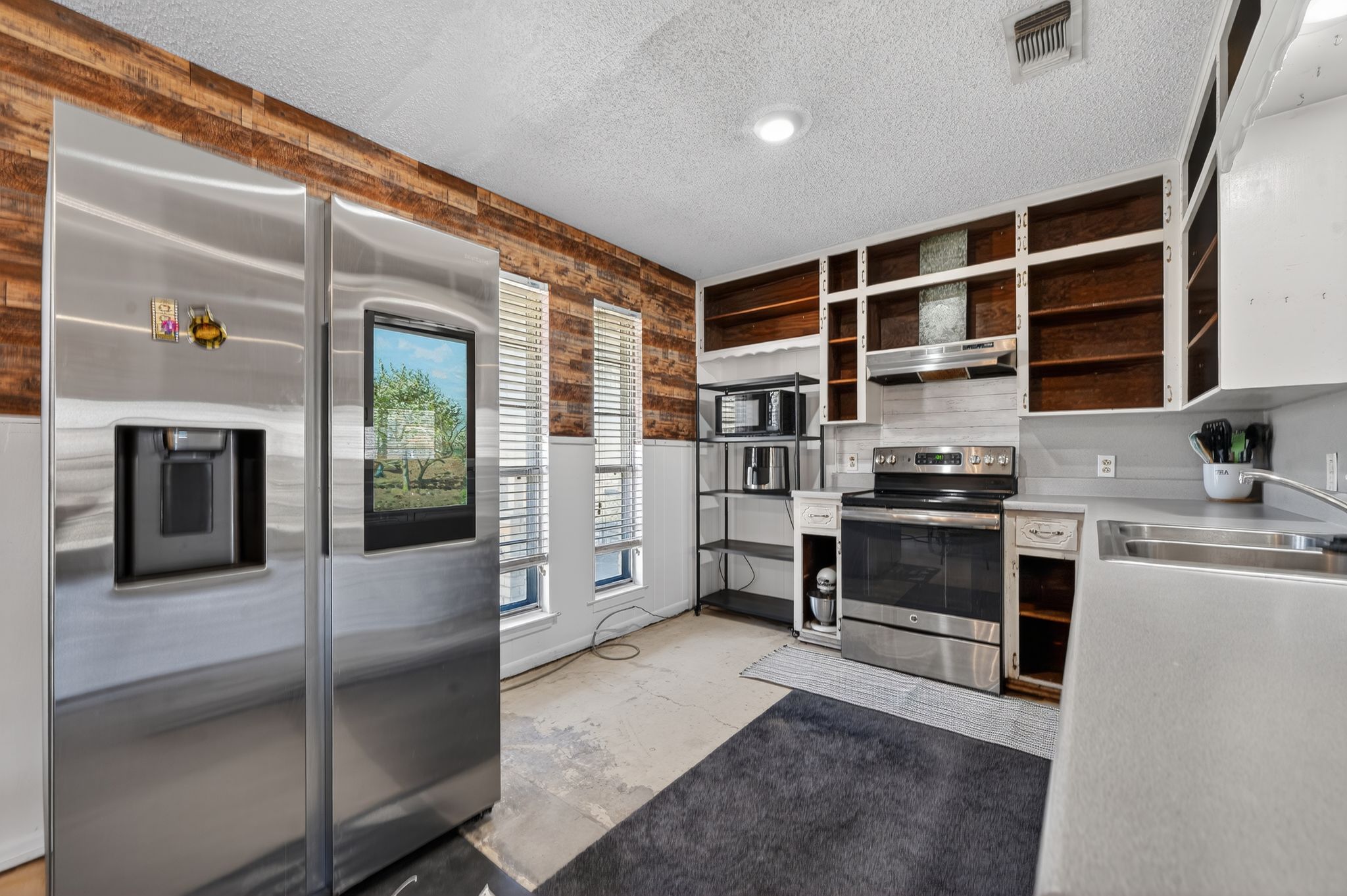 4610 Walnut Road Temple, TX 76502 - Photo 4 of 19 They kitchen is partially remodeled, and ready for your finishes.