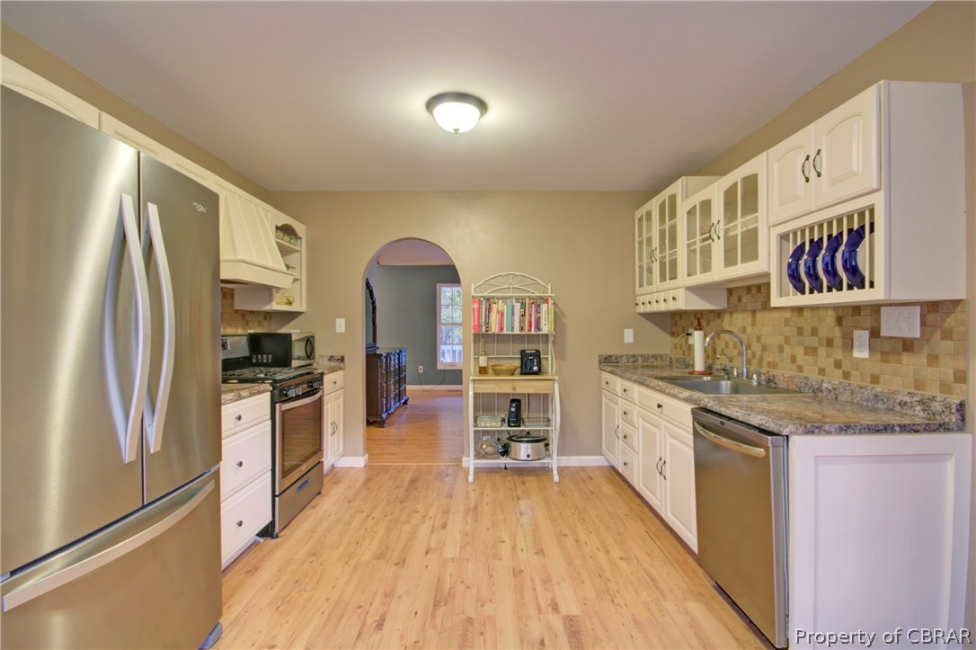8757 Glass Road Hayes, VA 23072 - Photo 12 of 34 Beautifully updated kitchen with stainless steel appliances.