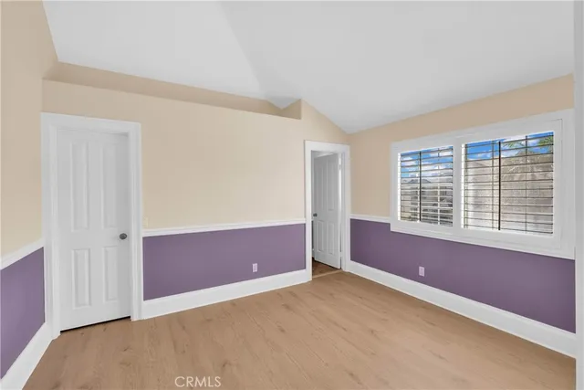 a front view of a house with swimming pool having outdoor seating