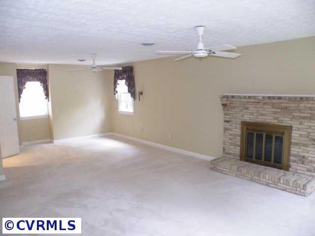 17611 Beach Road Chesterfield, VA 23838 - Photo 4 of 9 Other - Warm 18 ft family rm w/ brick, fireplace plus built-in bookcase