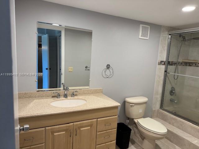 16300 Golf Club Road, Unit 208 Weston, FL 33326 - Photo 15 of 24 a bathroom with a sink toilet and shower