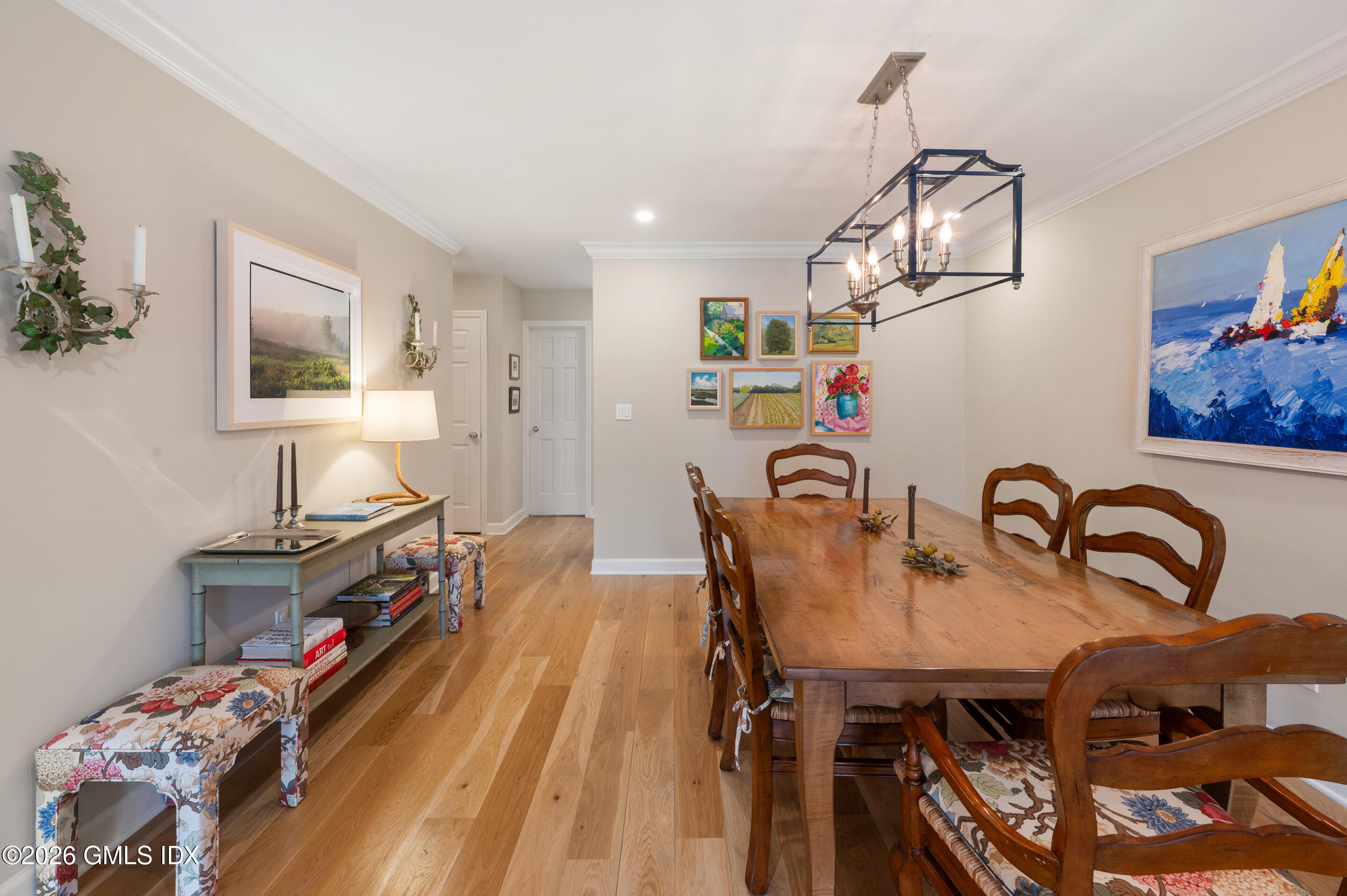 115 River Road, Unit 3 Cos Cob, CT 06807 - Photo 25 of 40 a dining room with furniture and wooden floor