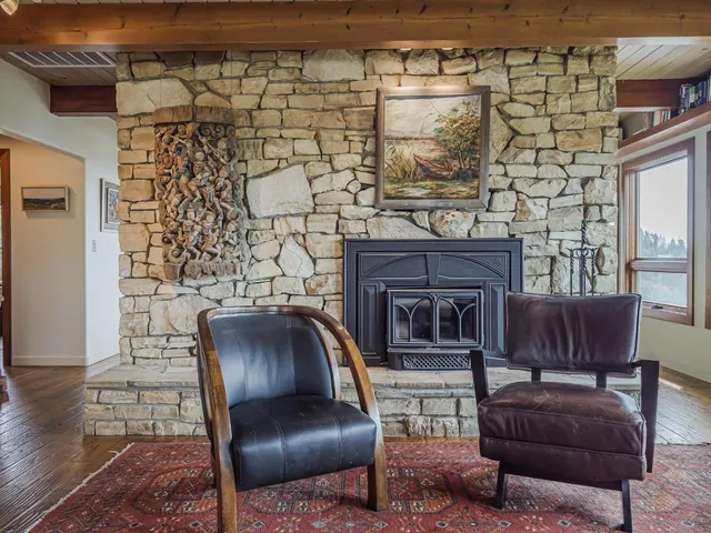 a kitchen with stainless steel appliances a stove top oven and cabinets