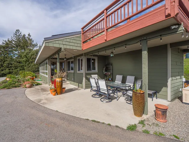 a bathroom with a shower toilet and sink