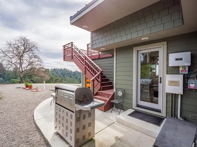 a view of a garden with mountains in the background