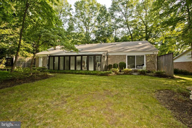 11245 Handlebar Road Reston, VA 20191 - Photo 16 of 27 a view of a house with a yard and sitting area