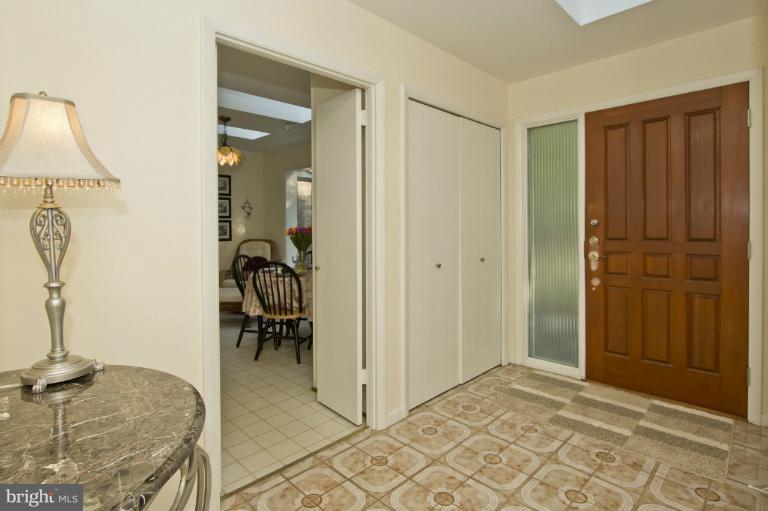 11245 Handlebar Road Reston, VA 20191 - Photo 17 of 27 a view of a livingroom with furniture and front door