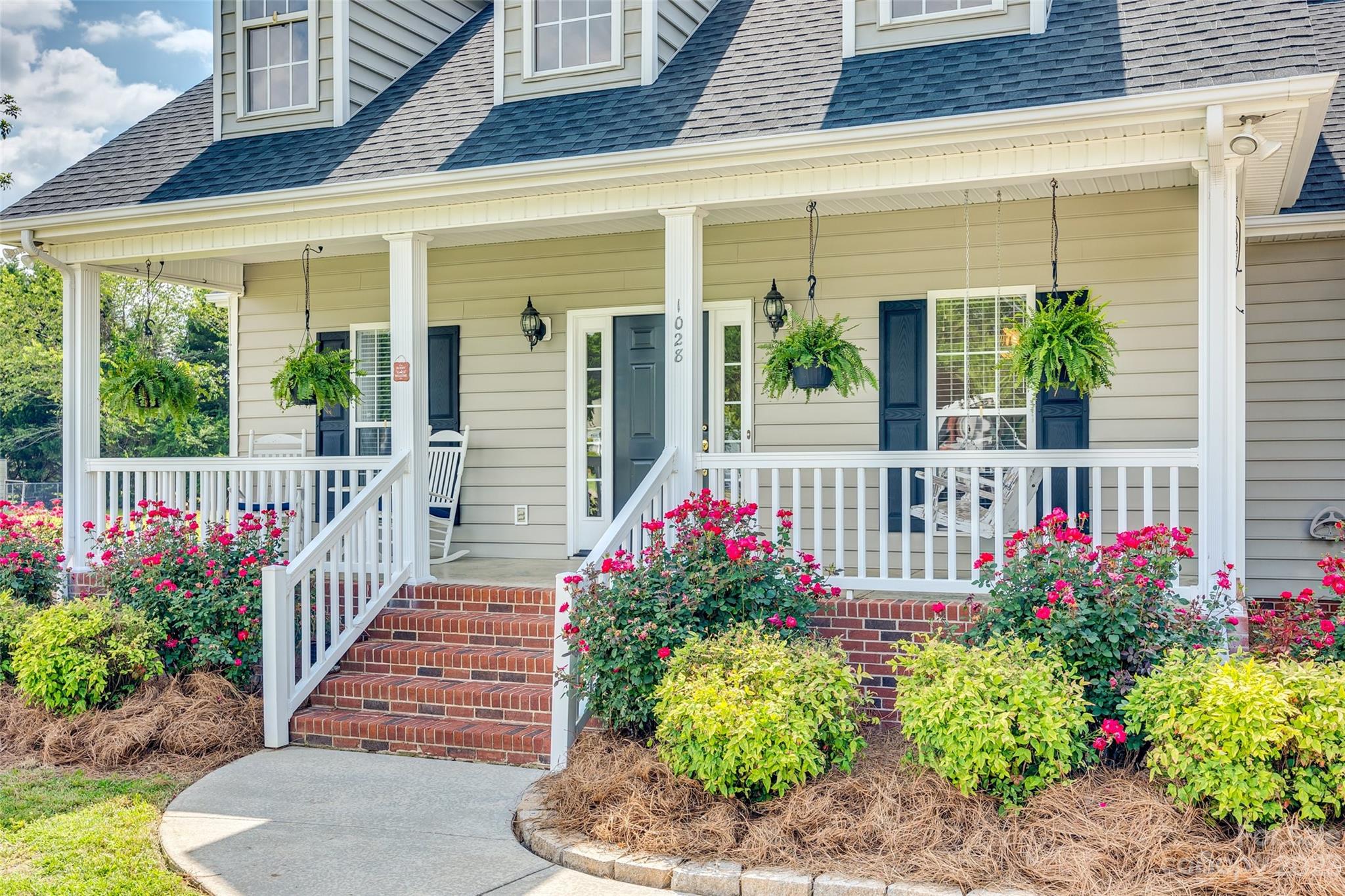 1028 Needles Drive Lancaster, SC 29720 - Photo 2 of 34 a front view of a house having fountain