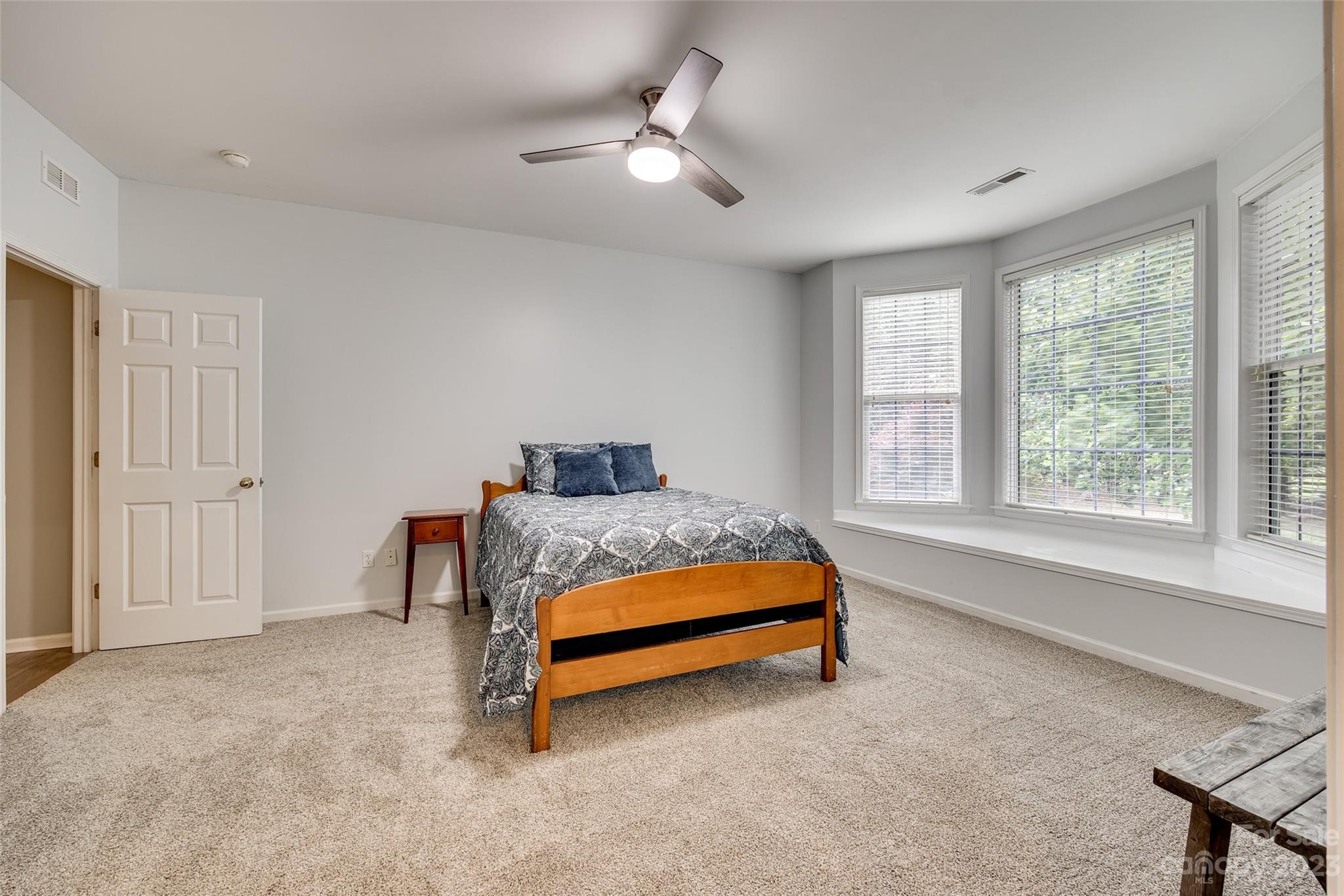 1028 Needles Drive Lancaster, SC 29720 - Photo 23 of 34 a bedroom with a bed and a window