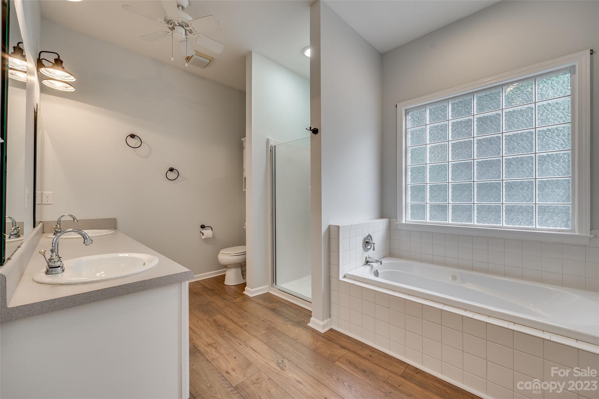 1028 Needles Drive Lancaster, SC 29720 - Photo 25 of 34 a bathroom with a bathtub and a sink