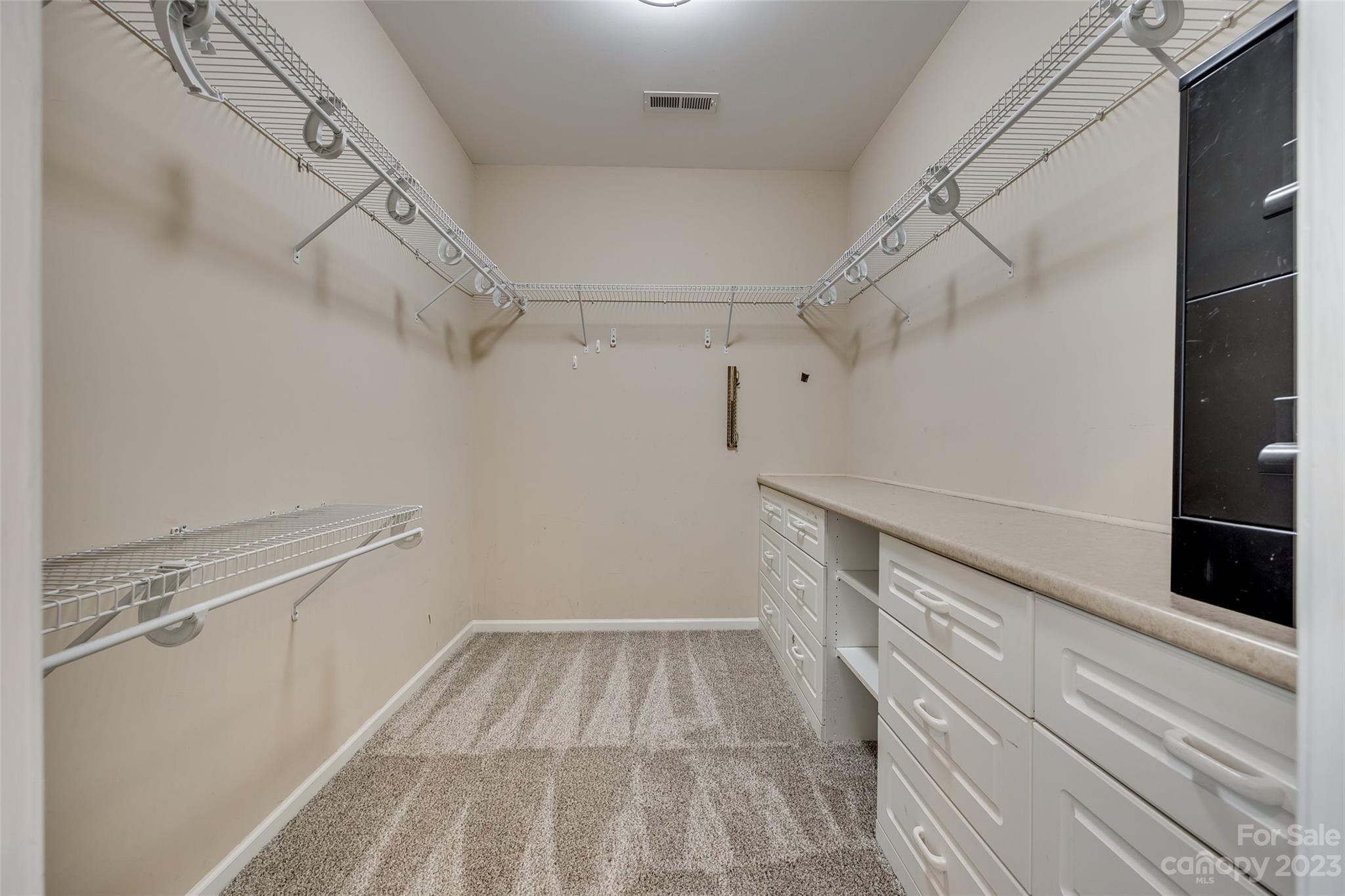 1028 Needles Drive Lancaster, SC 29720 - Photo 27 of 34 a view of a room with racks on the wall