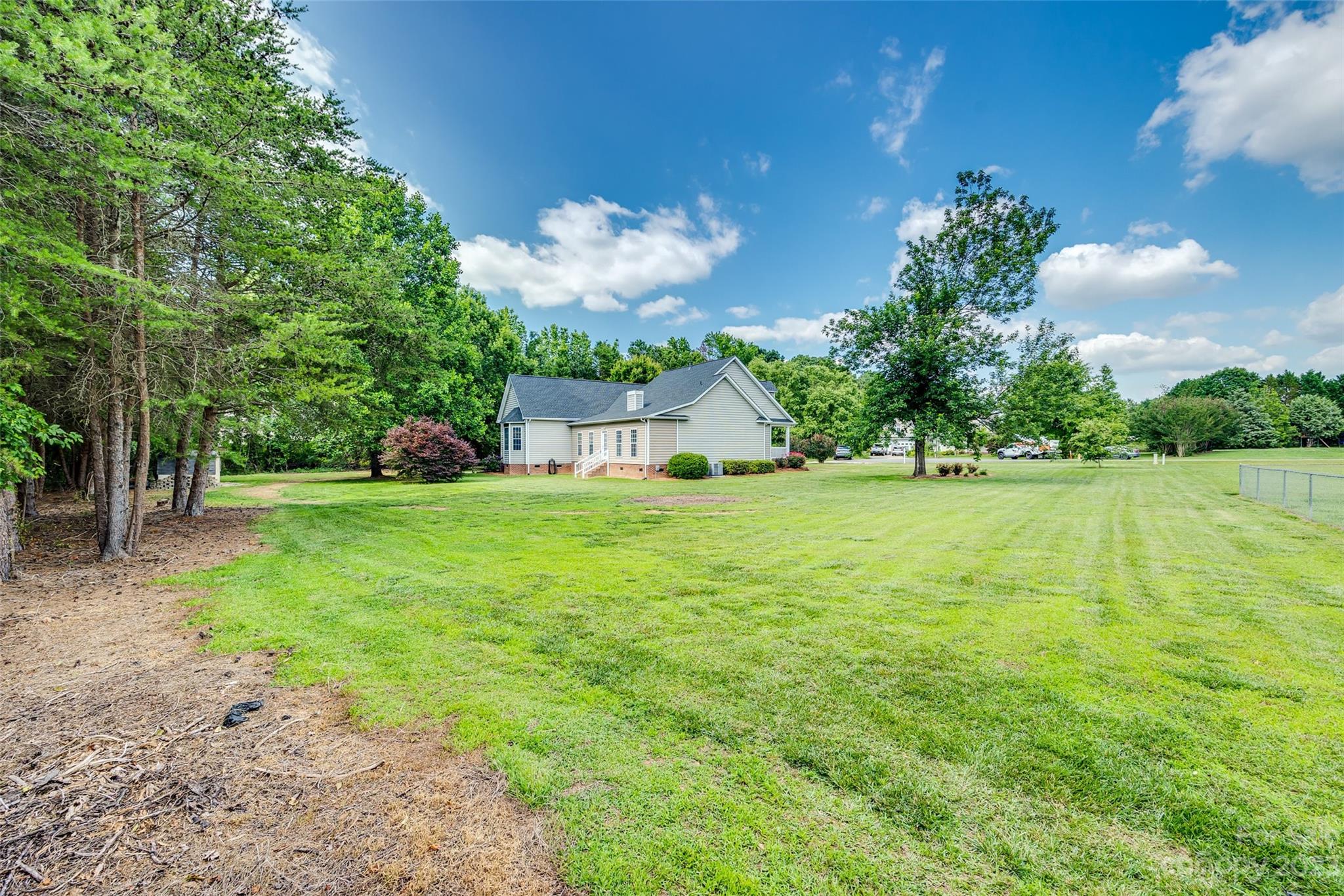 1028 Needles Drive Lancaster, SC 29720 - Photo 32 of 34 a house view with a garden space