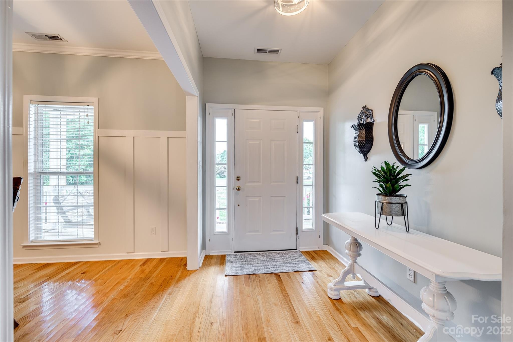 1028 Needles Drive Lancaster, SC 29720 - Photo 5 of 34 a bedroom with filled with furniture and wooden floor