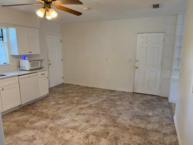 a view of a kitchen with a sink