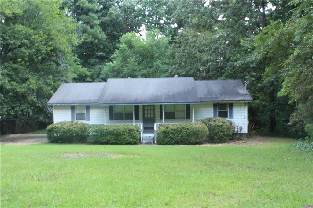 634 Frank Kirk Road Marietta, GA 30064 - Photo 1 of 1 a view of a house with garden and yard