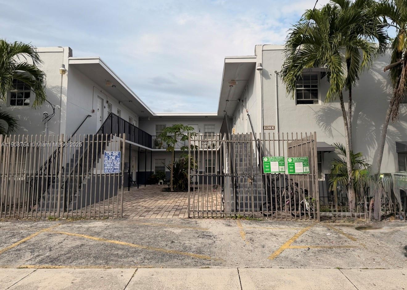 3615 Thomas Avenue, Unit 3 Miami, FL 33133 - Photo 1 of 6 a view of a house with iron fence