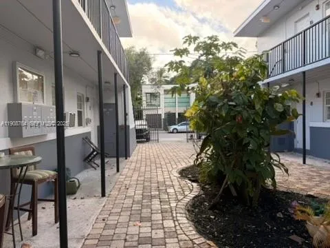 a view of a pathway with a house