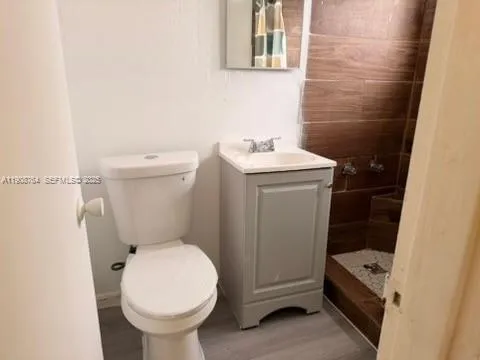 a bathroom with a sink and a toilet