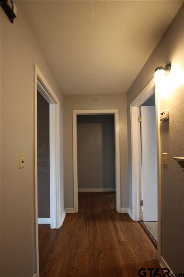 427 East 5th Street Tyler, TX 75701 - Photo 9 of 23 a view of entryway with wooden floor
