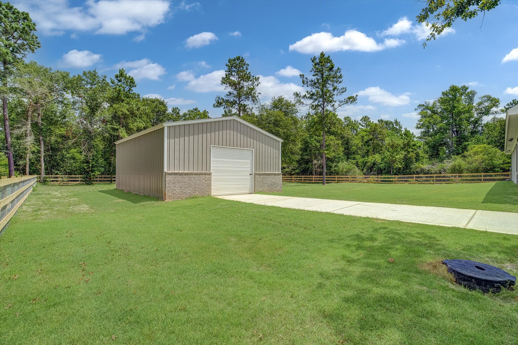 347 Iron Horse Road Willis, TX 77378 - Photo 30 of 49 West side of workshop