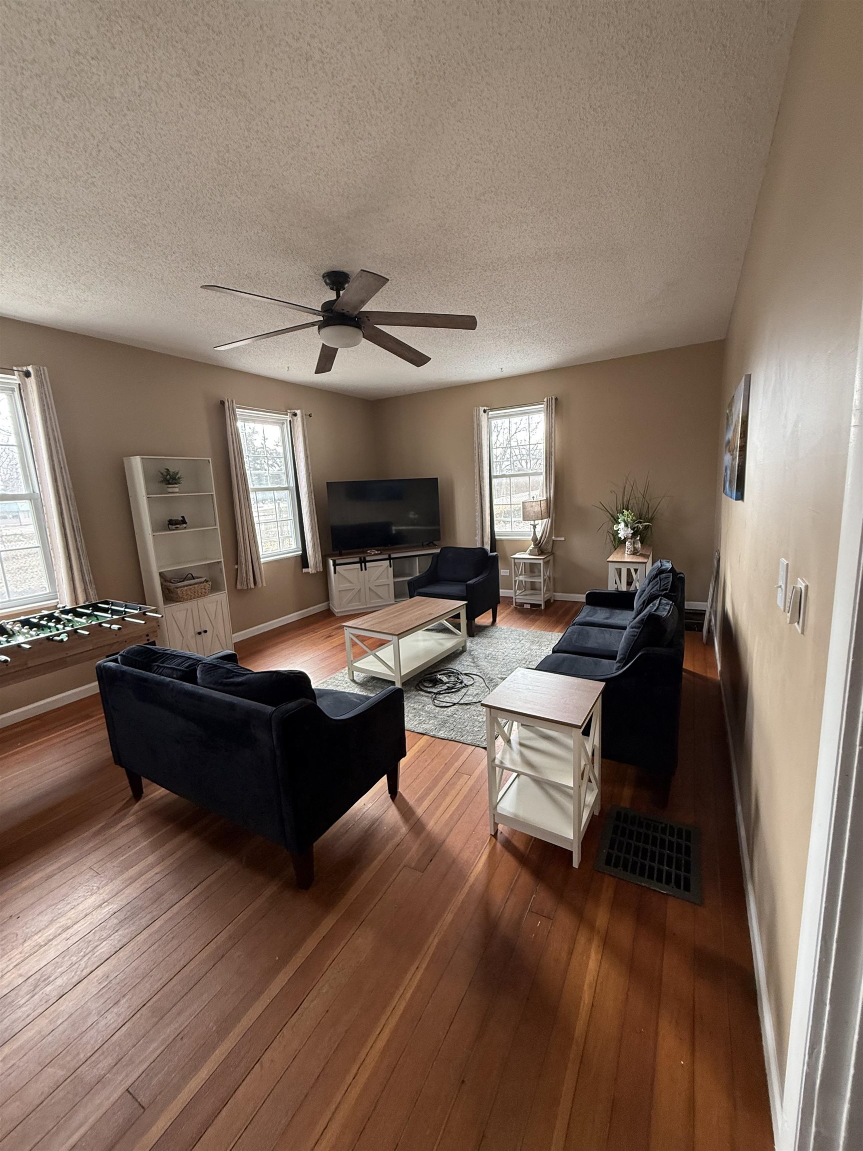 8894 North Il Route Byron, IL 61010 - Photo 2 of 13 a living room with furniture and a wooden floor