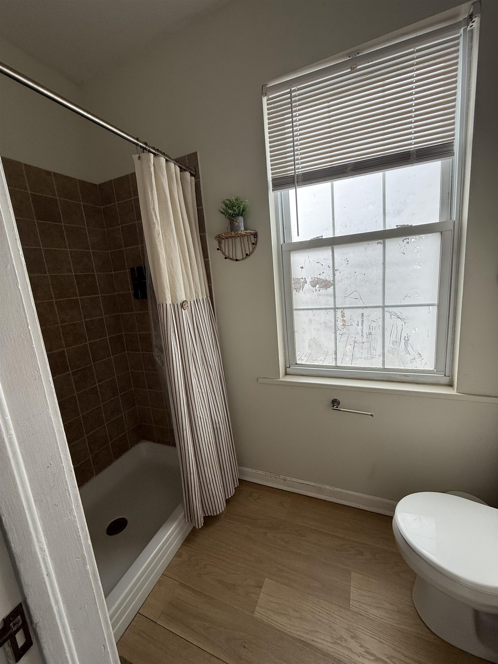 8894 North Il Route Byron, IL 61010 - Photo 5 of 13 a bathroom with a toilet and a shower