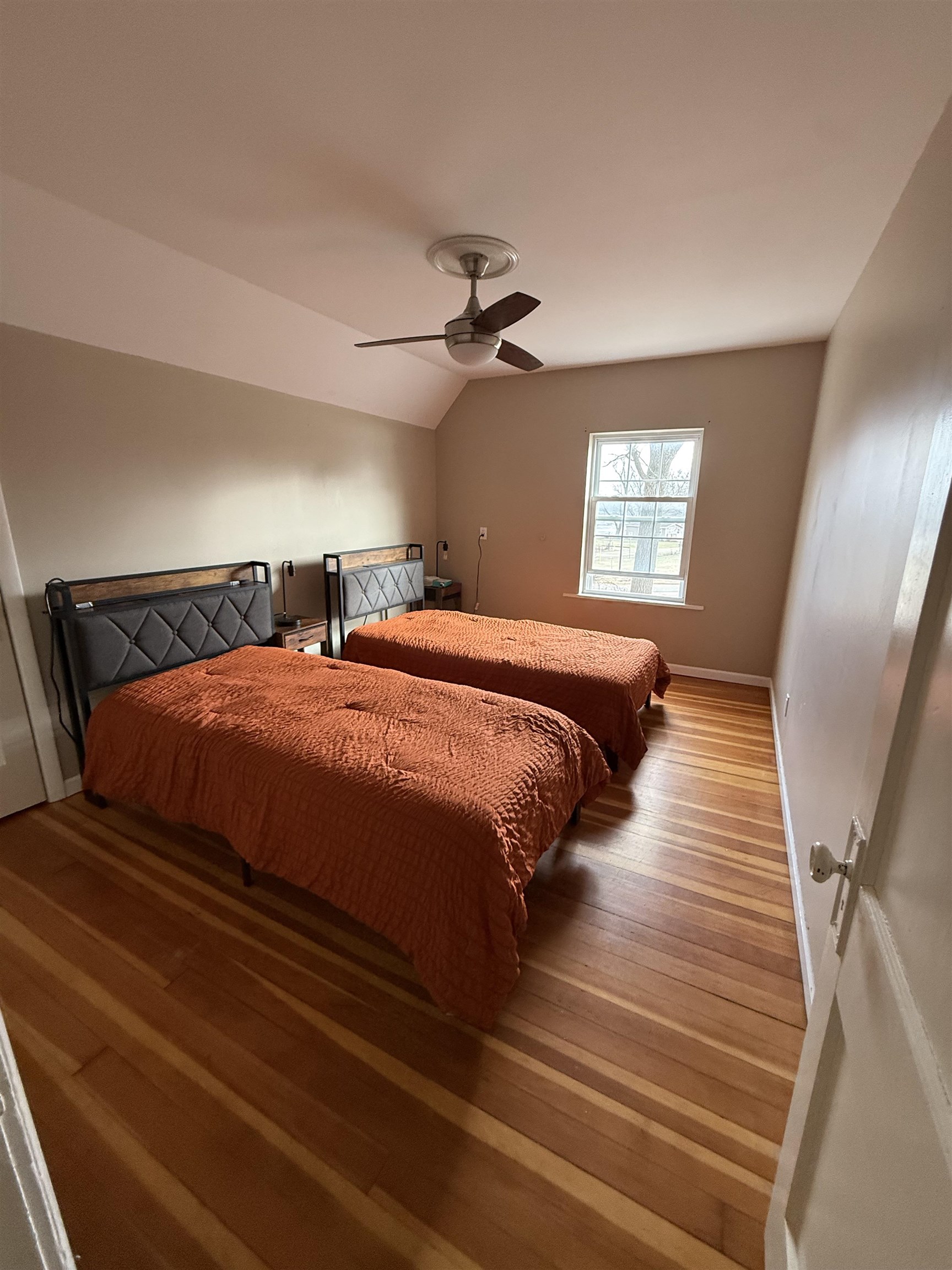 8894 North Il Route Byron, IL 61010 - Photo 7 of 13 a bedroom with double bed and a window