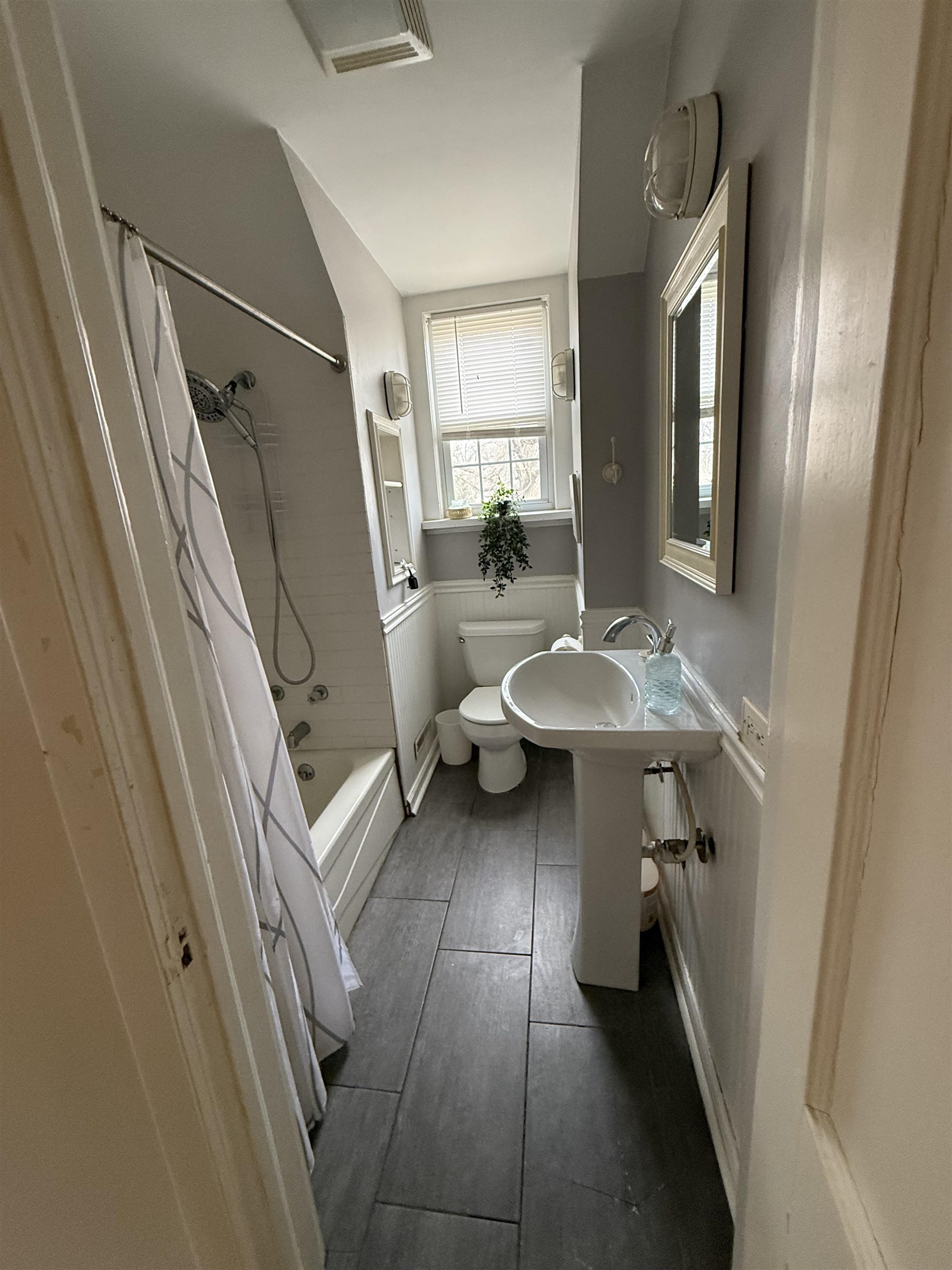 8894 North Il Route Byron, IL 61010 - Photo 8 of 13 a bathroom with a toilet a sink and mirror