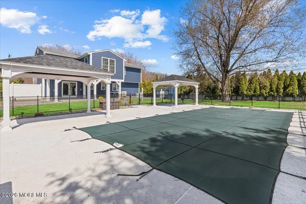 a view of a house with a patio