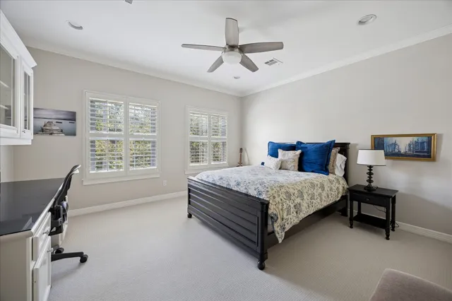 a bedroom with a bed furniture and window