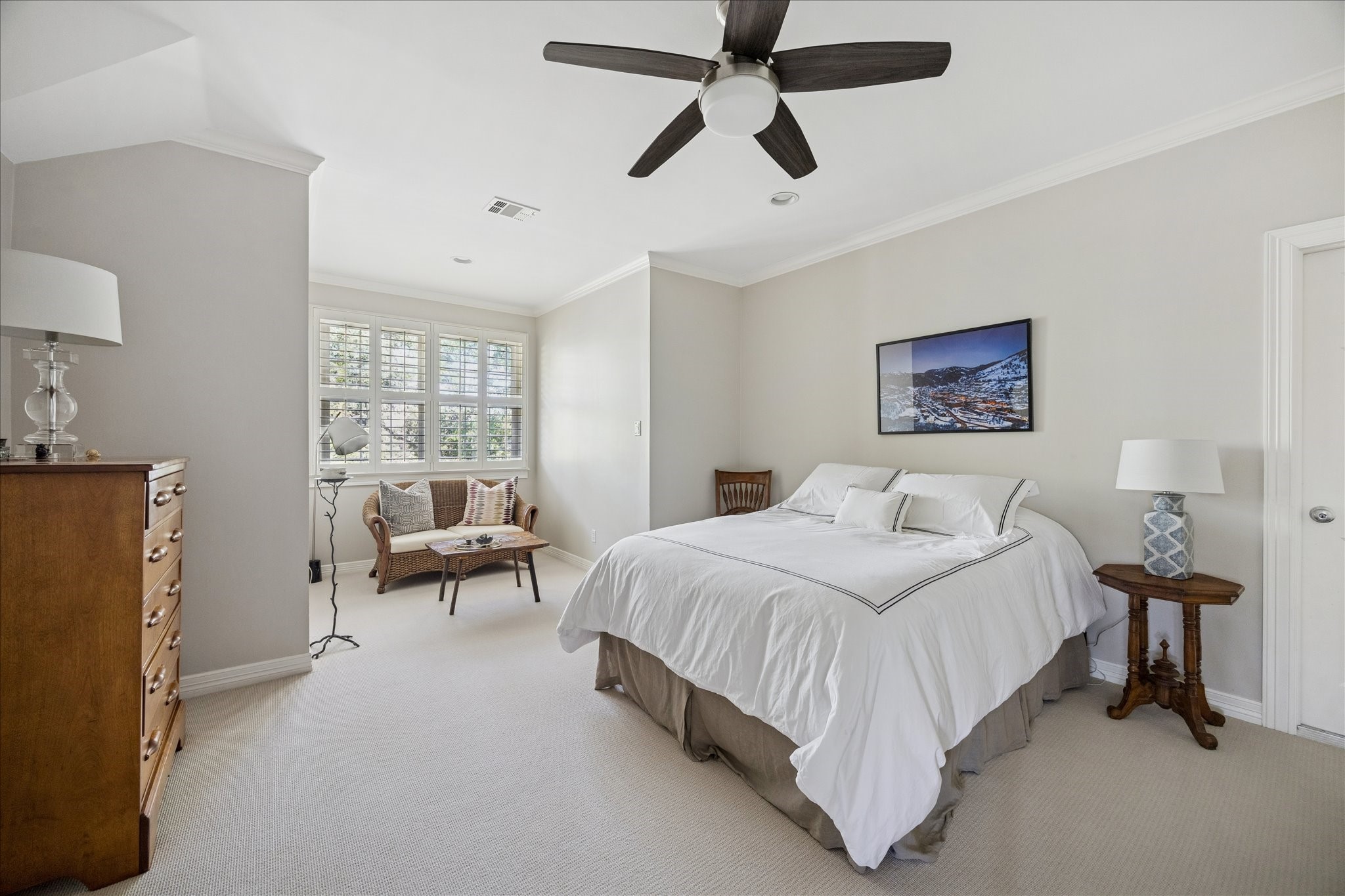 2 Blalock Pines Court Hedwig Village, TX 77024 - Photo 32 of 44 a bedroom with a bed and a chandelier