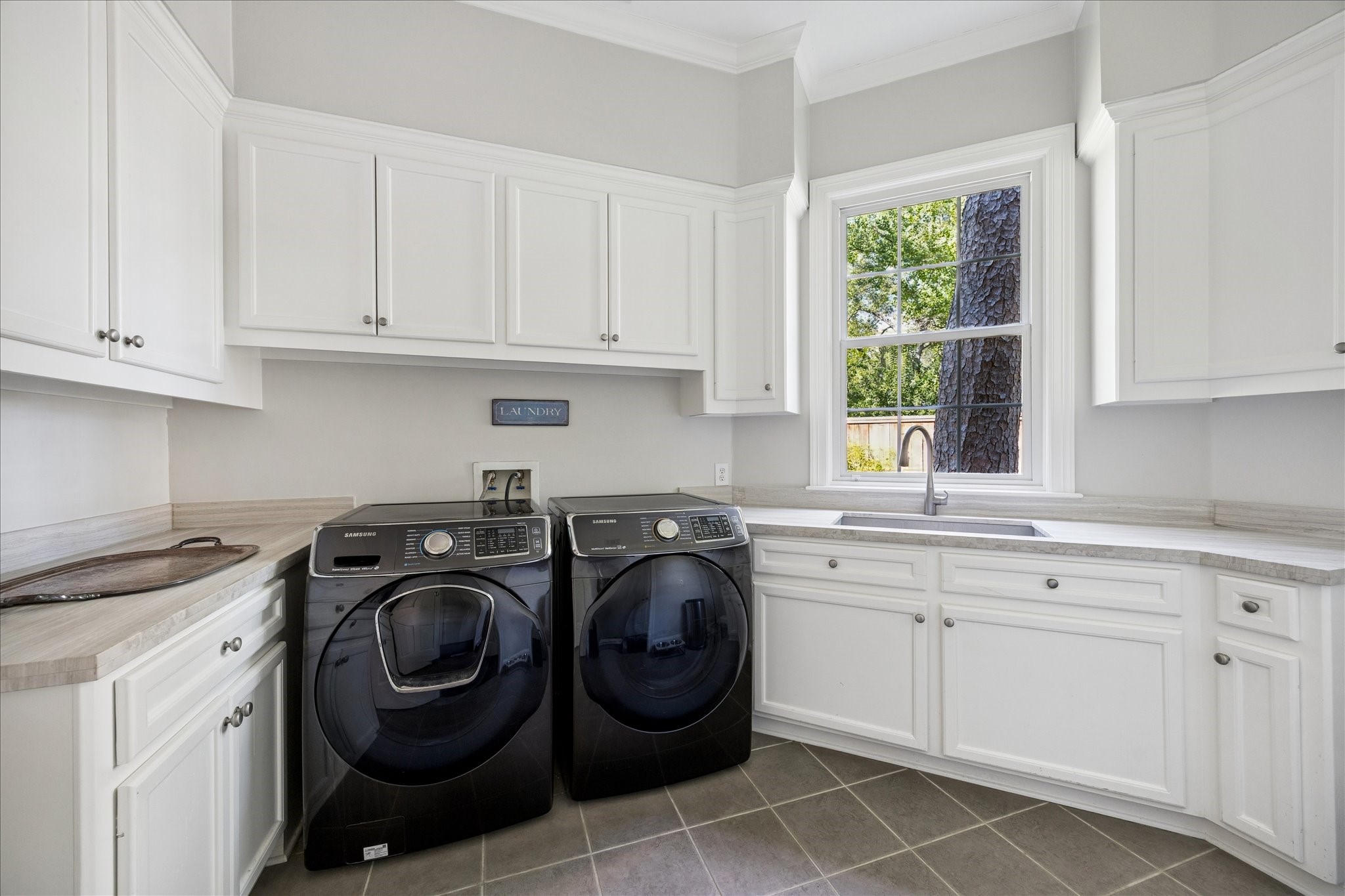 2 Blalock Pines Court Hedwig Village, TX 77024 - Photo 35 of 44 a utility room with sink dryer and washer