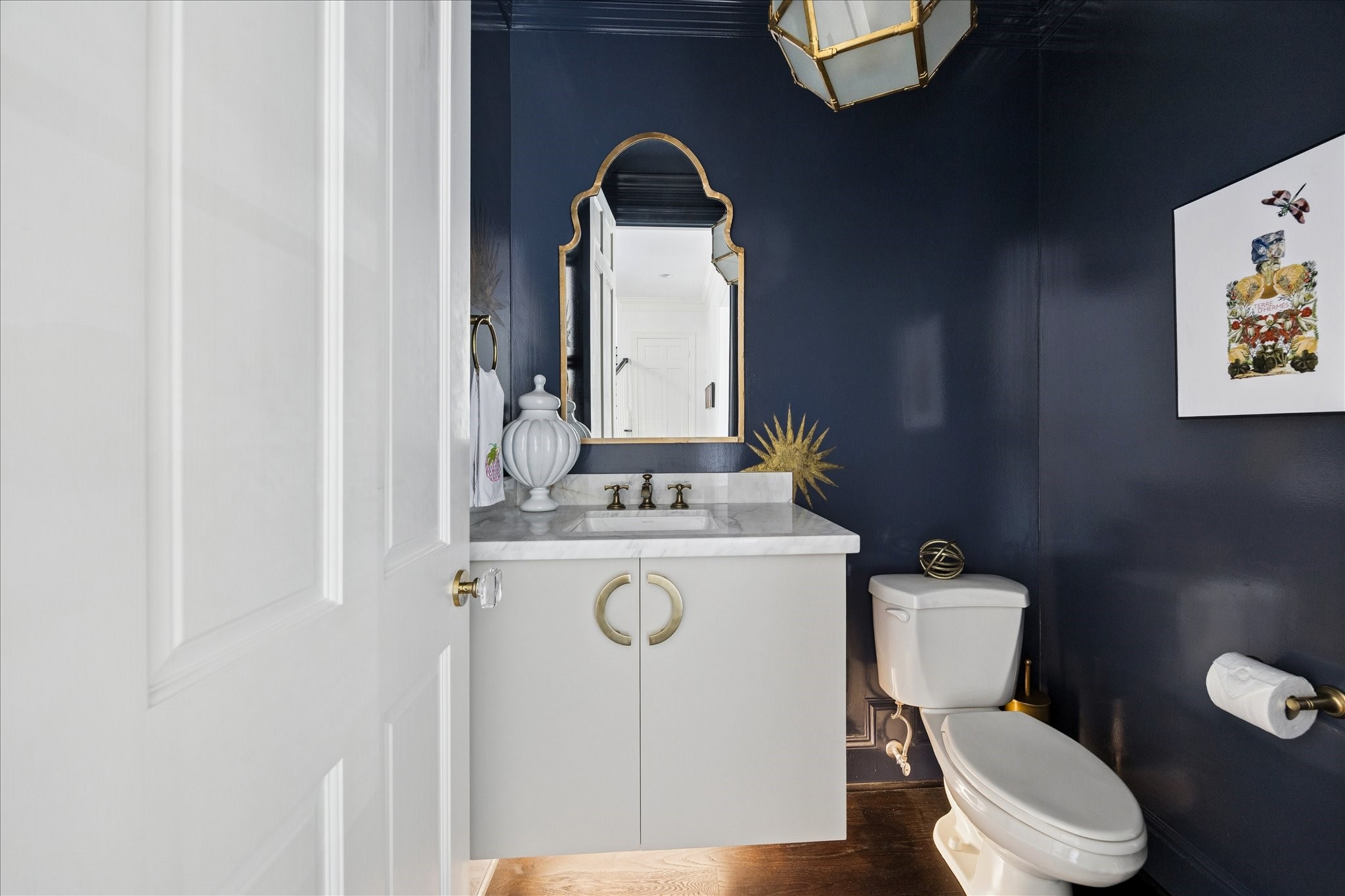 2 Blalock Pines Court Hedwig Village, TX 77024 - Photo 36 of 44 a white toilet sitting next to a bathroom sink